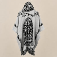 Ton poncho Poncho En Maille À Capuche Motif Ethnique
